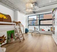 Children's room with a bunk bed and a large window in a 4-room apartment.