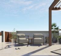 A terrace with chairs and plants in a 4-room apartment in Pilar de la Horadada.