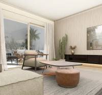 Living room with an armchair, table, cactus, and large window in a 4-room apartment.