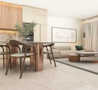 Living room in a 4-room apartment with comfortable furniture, a wooden table, and modern decoration.