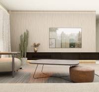 Living room in a 4-room apartment with modern furniture, a plant, and a large picture frame.