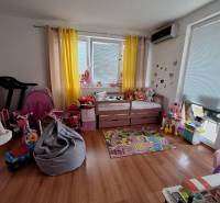 A children's room full of toys and colorful decorations in a 3-room apartment.