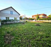 A family house in Kuzmice with a large yard and a well-maintained garden.