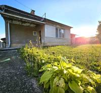 A family house in Kuzmice with a landscaped garden and sunlight exposure.