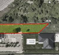 Aerial view of a residential plot in Nové Mesto nad Váhom near the railway track.