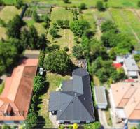 Aerial view of a family house in Tvrdošovce with a spacious garden.