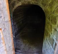 Stone cellar in a family house, Hont, with an atmospheric vaulted ceiling and stone stairs.