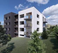 An apartment building in Lubina surrounded by greenery, offering 3-bedroom apartments with balconies.