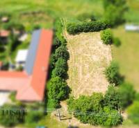 Plots - residential areas in Kynceľové Kračany in Dunajská Streda, rectangular plot with grass.