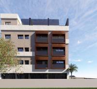A building in San Pedro del Pinatar with balconies and greenery in front of a 3-room apartment.