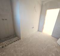 The interior of a family house bathroom under construction, ready for installations.
