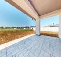 The terrace of a family house on Jarna Street in Hviezdoslavov with a view of the field.
