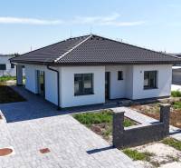 The family house on Jarná Street in Hviezdoslavov is surrounded by a paved area and a garden.