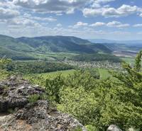 View of agricultural and forest lands around the town of Humenné with a mountain panorama.