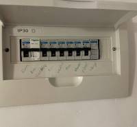 Electrical distribution box in a 3-room apartment with circuit breaker descriptions.