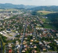 Aerial view of Unique Properties in Žilina, surrounded by nature and greenery.
