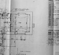 Floor plan of office space in a building with room details and materials.