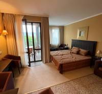A recreational apartment with a bedroom, terrace, and comfortable furniture for a relaxing stay.