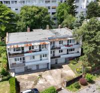 An apartment building surrounded by greenery on Molecova Street in Bratislava - Karlova Ves.