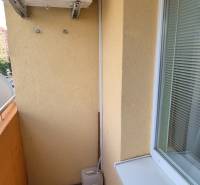 Balcony in a 1-room apartment with air conditioning, suitable for relaxation.