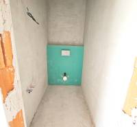 Interior of a family house with installation for a toilet, ready for further modification.