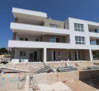 A recreational apartment in the town of Vodice on Stablinac Street with an unfinished exterior.