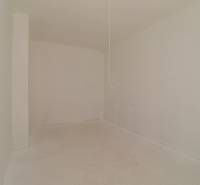 Empty interior with white walls and floor in a Holiday Apartment.