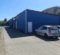 Blue building on Textilná Street in Košice - Nad jazerom district, warehouses and halls.