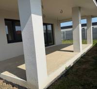 A family house in Galanta Košúty with a spacious terrace and supporting columns.