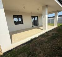 A family house in Galanta Košúty with a terrace and white columns.