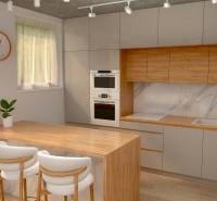 A kitchen in a 2-room apartment with wooden elements and a dining counter.
