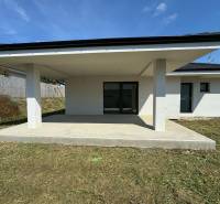Family house in Kynk, Nitra with a covered terrace and grassy plot.