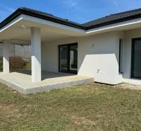 A family house in Kynek, Nitra with a terrace and a grassy plot.