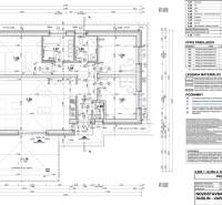Floor plan of a family house with a relaxation area, kitchen, and bathrooms.