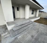 Entrance steps and terrace of a family house in Western Slovakia with new paving.