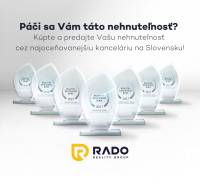 Awards for the real estate agency RADO Reality with a text about property sales.