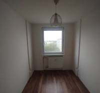 A room in a 3-room apartment with light and wooden flooring, suitable for customization.