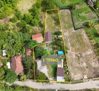 Aerial view of a family house in Kolárovo surrounded by lush vegetation.