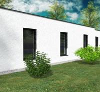 A family house in Western Slovakia with a garden and a simple white facade. Construction of houses.
