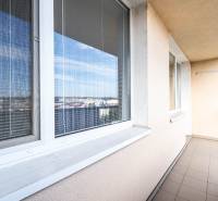Balcony of a 3-room apartment with a railing and a view of Košice on Žižkova Street.