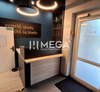 Reception with a counter and designer lights in the office.