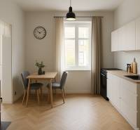 A bright kitchen with a dining table and a stove in a studio apartment.