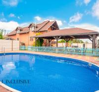 Hotels and guesthouses in Veľký Meder have a pool with a terrace and a gazebo.