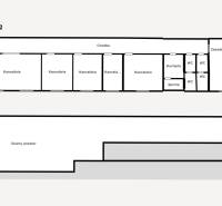 Floor plan of spaces with offices, kitchen, shower, and toilet, with storage space of 72 m².