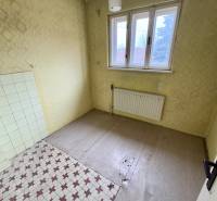 An empty room on Lietavská Lúčka Street, awaiting renovation in a 3-room apartment.