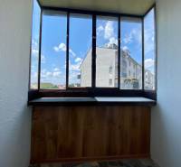 The 3-room apartment has a glazed loggia with a view of the housing estate.