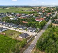 Aerial view of family houses in the village of Veľký Grob on Fialková Street.