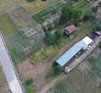 Agricultural landscape and houses by the road in Štrkove, Construction of houses.