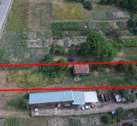 Land marked by a red line in the area of House Construction, Štrkovec.