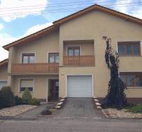 A family house on Športová Street in Brodské with a garage and a garden.